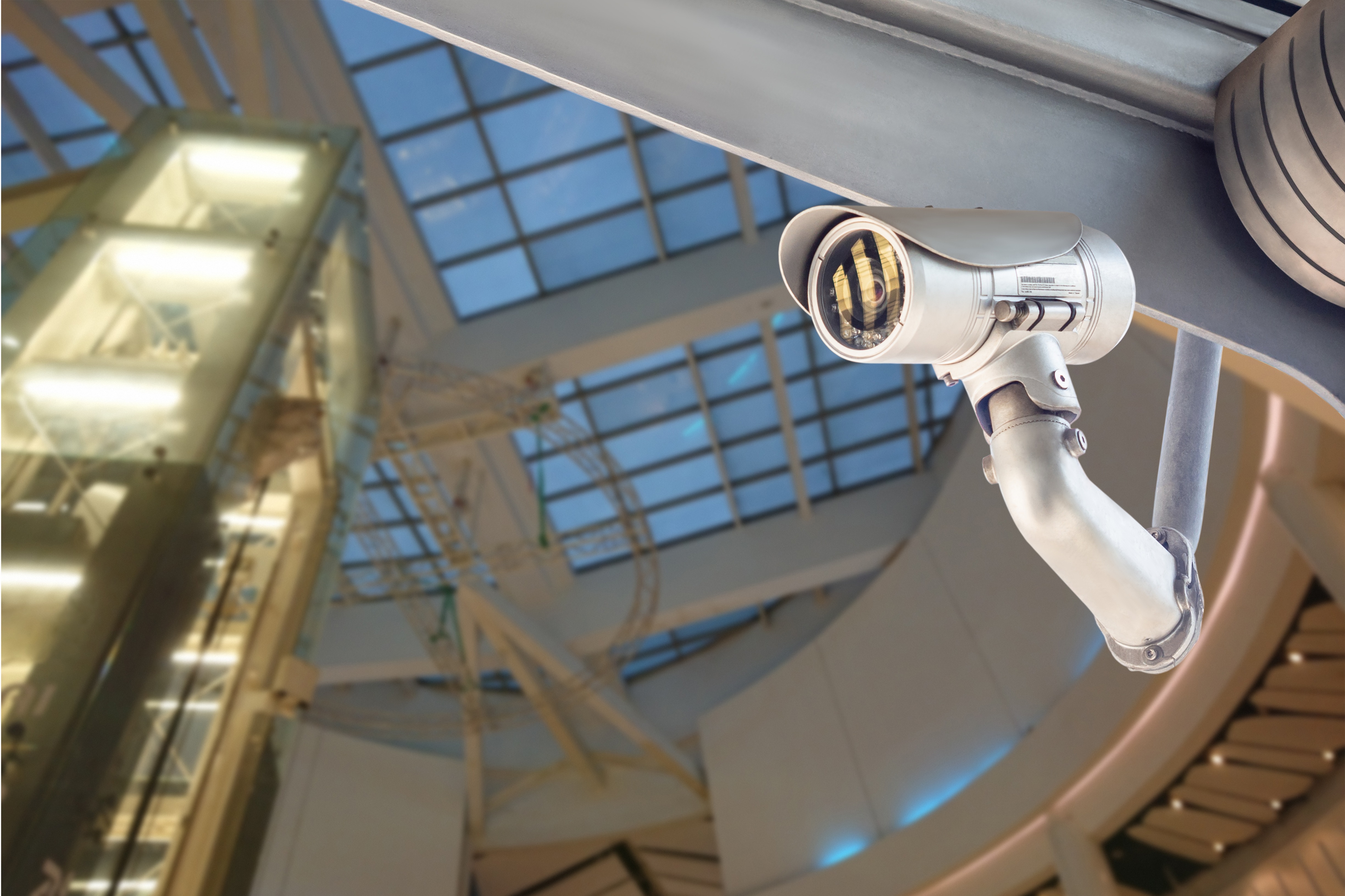 security camera surveillance installed on ceiling to monitor